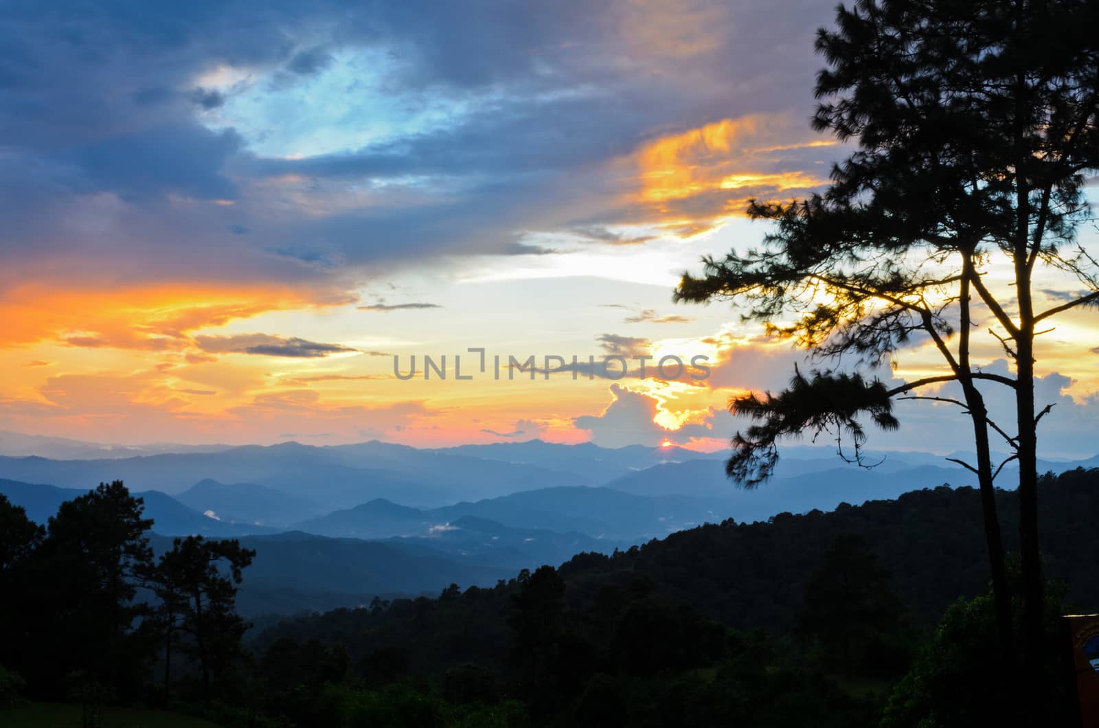 Sunset over high mountain range at viewpoint in Huai Nam Dang national park in Chiang Mai and Mae Hong Son of Thailand