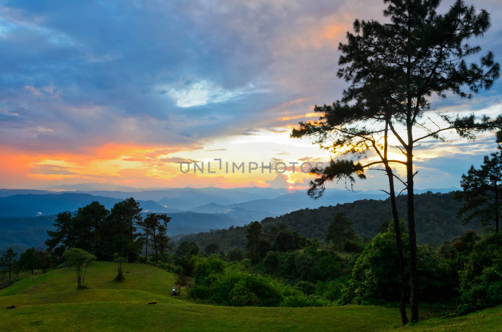 Sunset over high mountain range at viewpoint in Huai Nam Dang national park in Chiang Mai and Mae Hong Son of Thailand