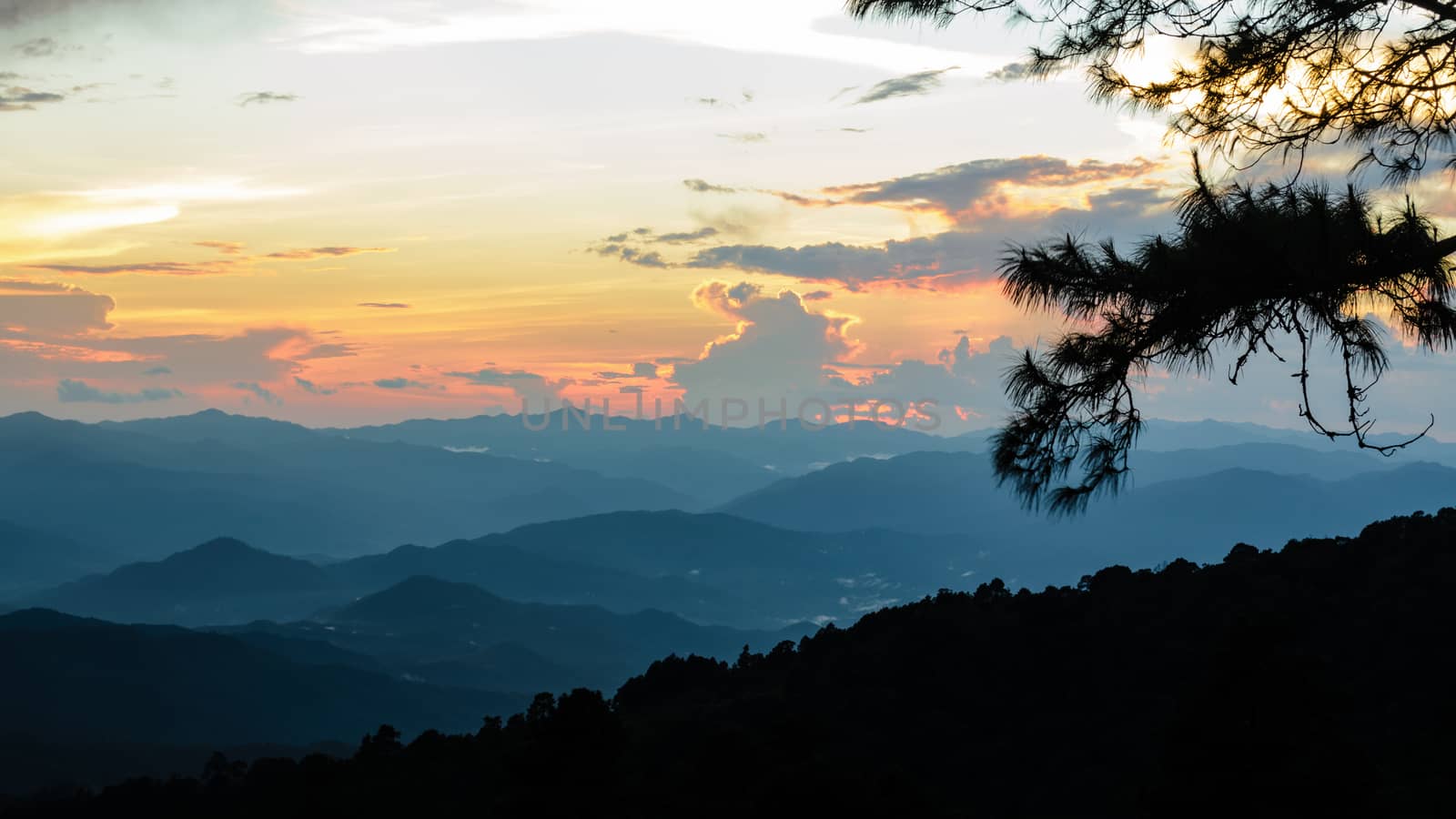 Sunset over high mountain range at viewpoint in Huai Nam Dang national park in Chiang Mai and Mae Hong Son of Thailand