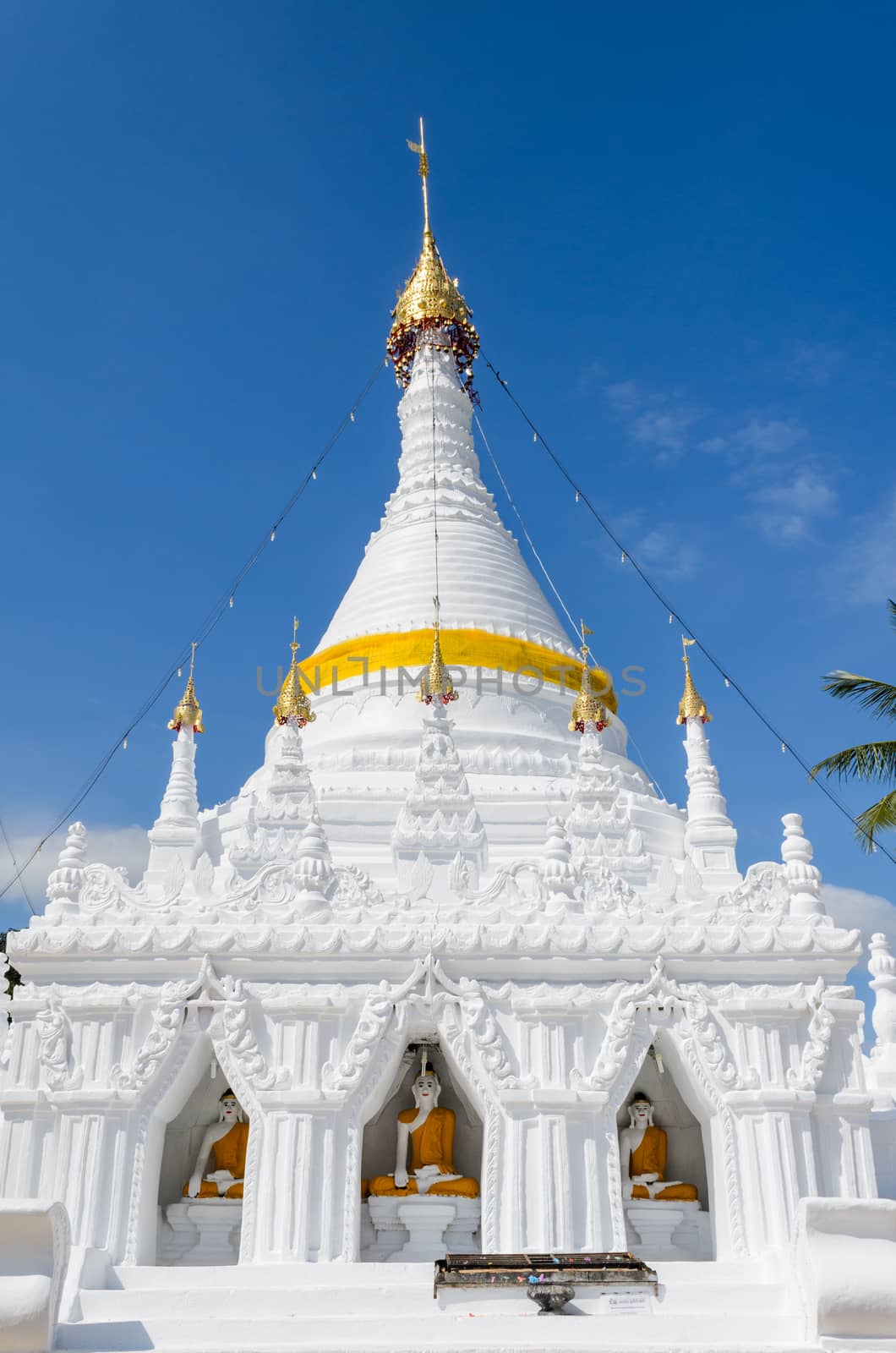 White pagoda architecture at Wat Phra That Doi Kong Mu Temple in Mae Hong Son Province of northern Thailand.