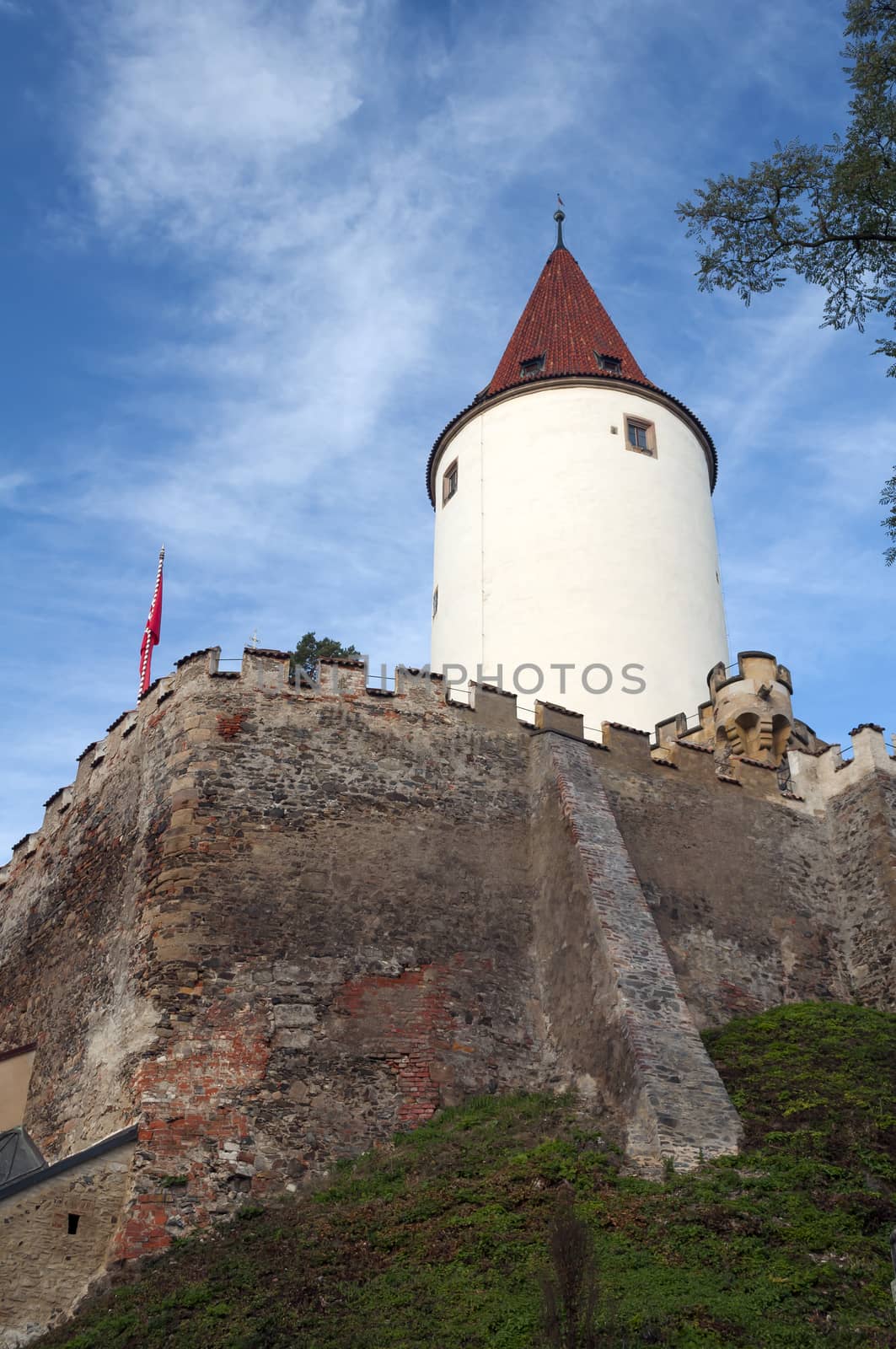 Medieval castle tower and defensive wall in Central Bohemia, Czech Republic.