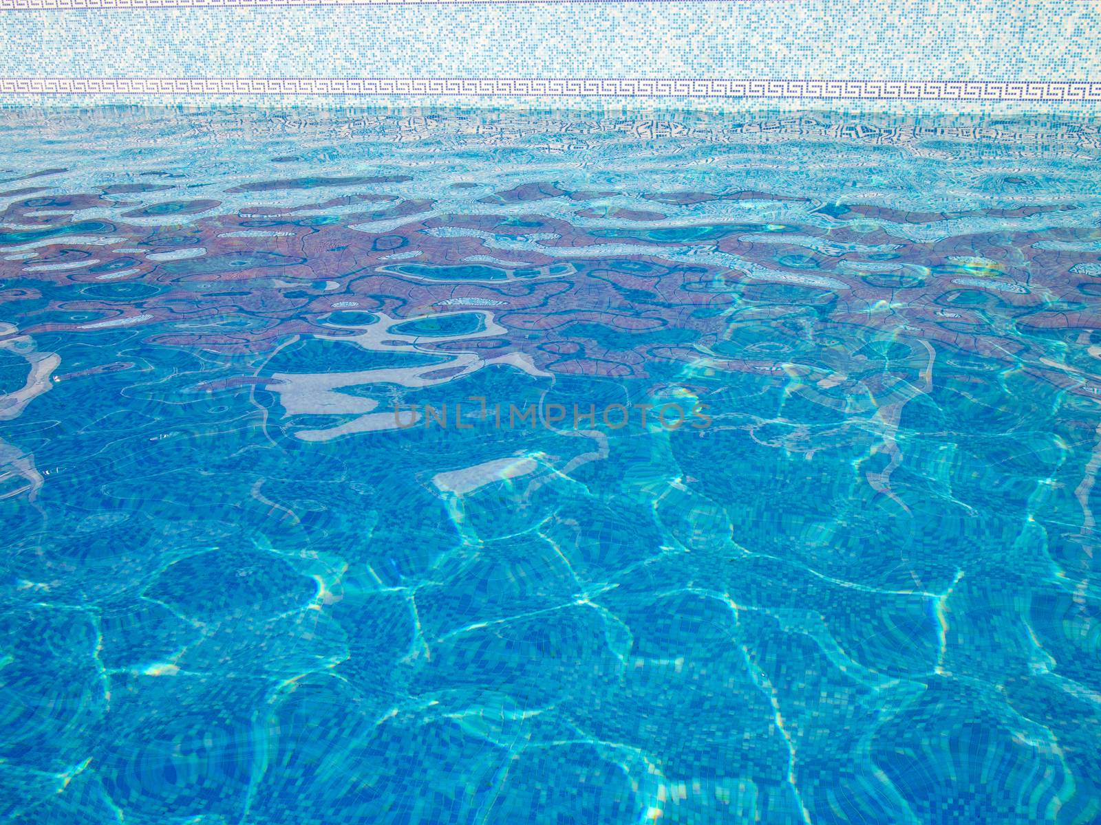 Clear blue water in a swimming pool