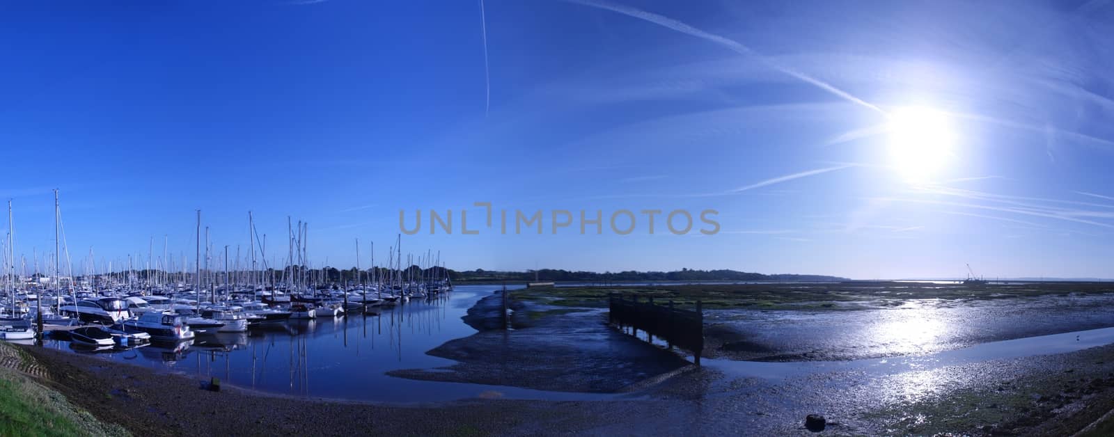 sailing and power boats moored in lymington marina by chrisga