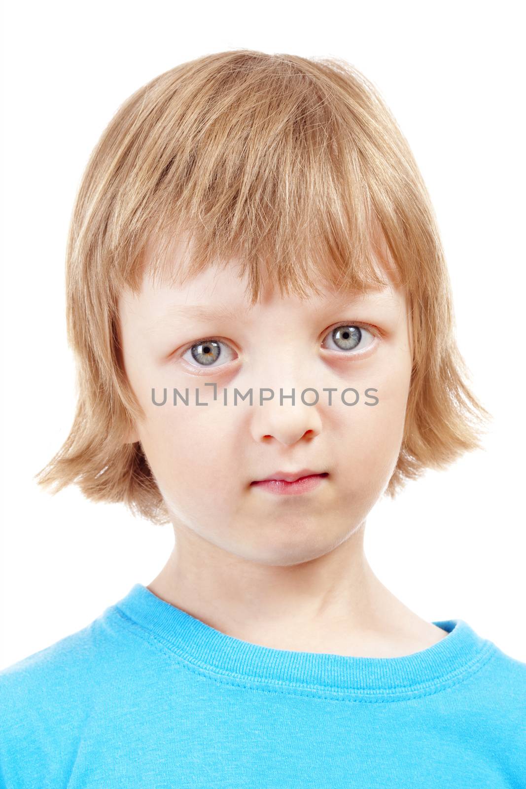 portrait of a boy with blond hair in blue top - isolated on white