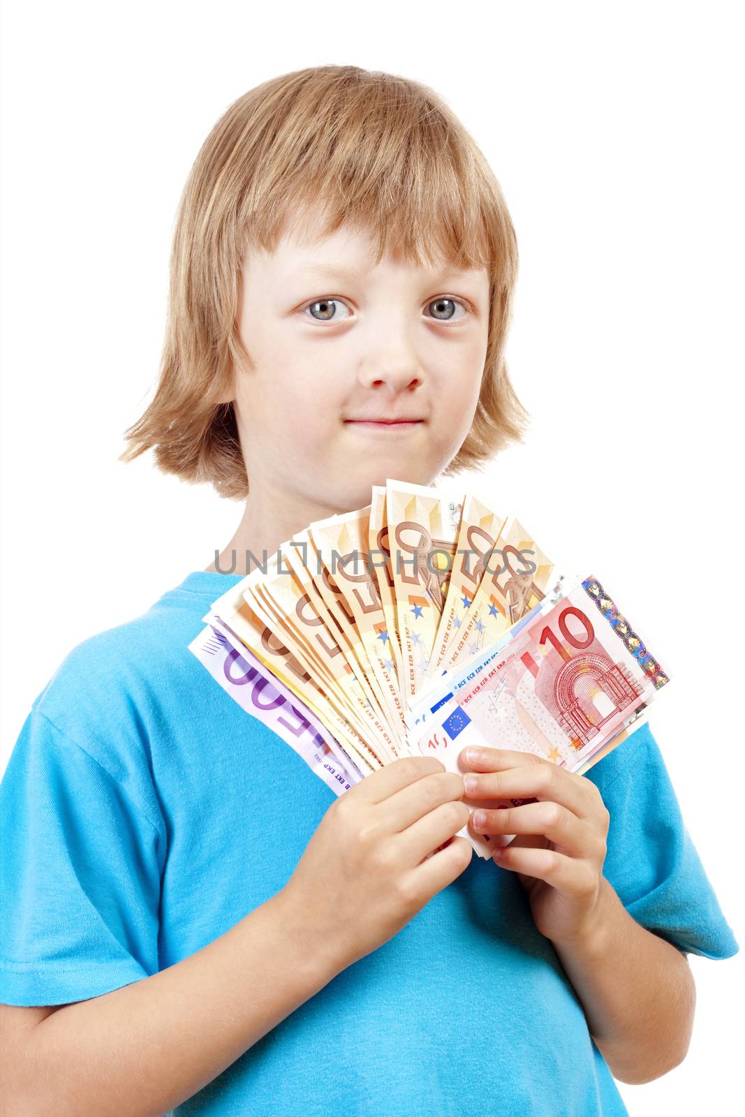 BOY WITH BLOND HAIR HOLDING UP EURO BANKNOTES.