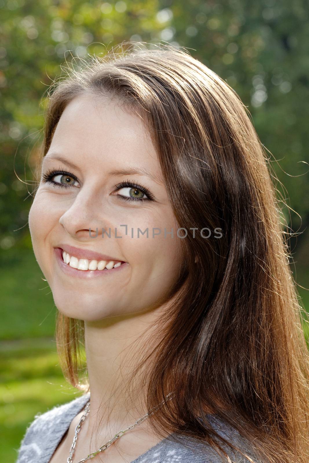 portrait of a happy young girl smiling