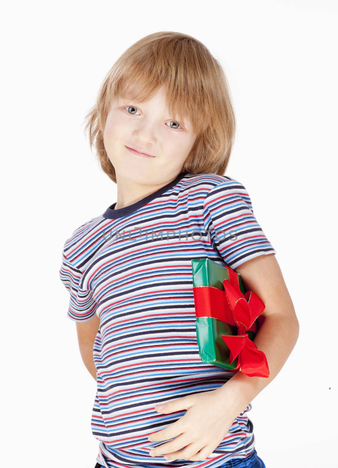 Boy Holding a Present - Isolated on White