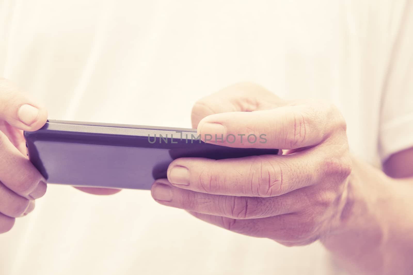 Close up of man checking his phone