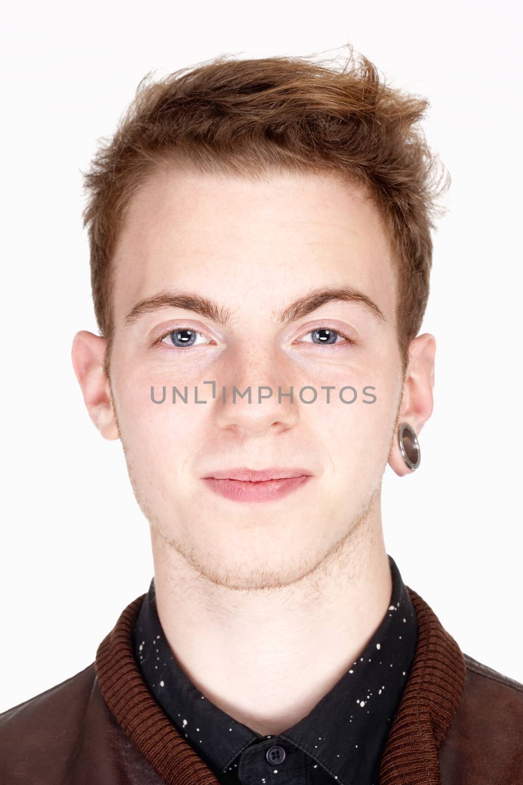 portrait of a teenage boy with brown hair - isolated on white