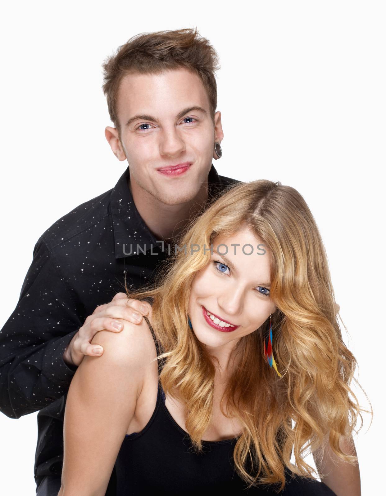 portrait of a teenage couple - isolated on white