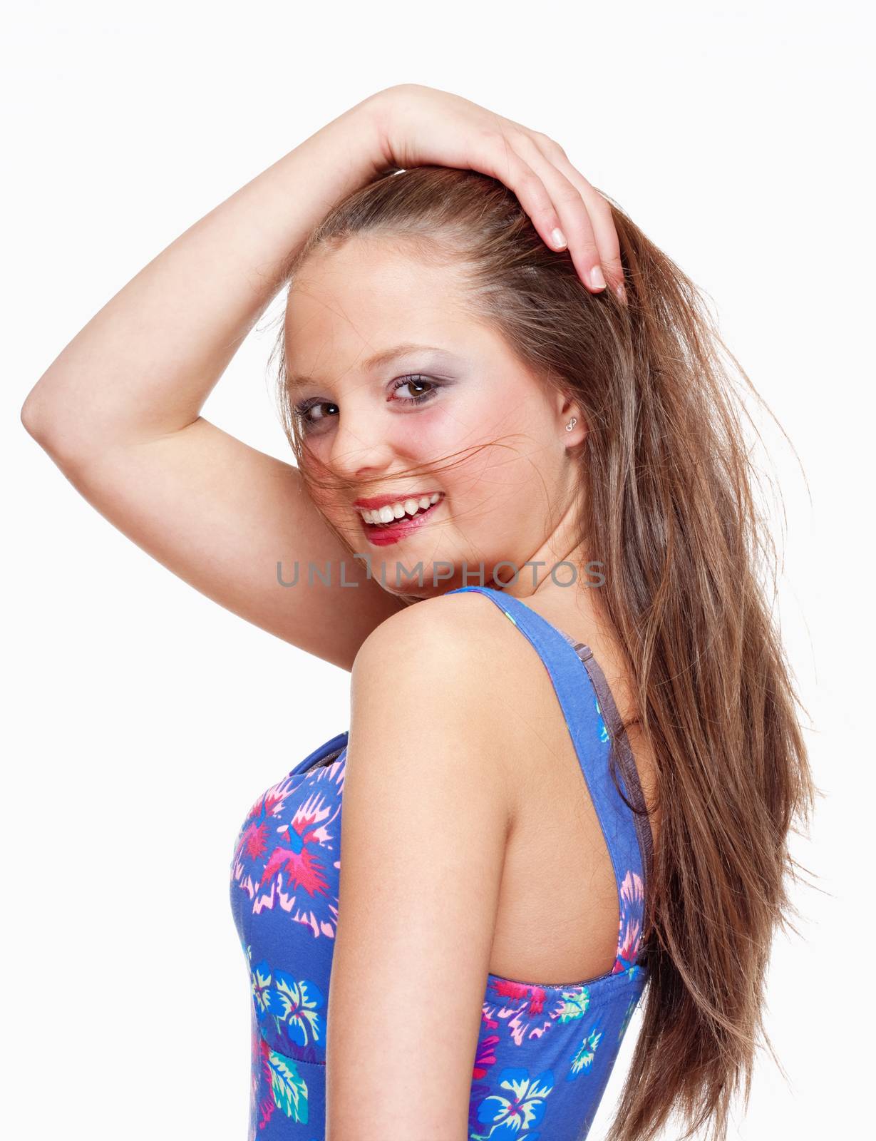 Portrait of a Teenage Girl with Long Brown Hair Smiling - Isolated on White