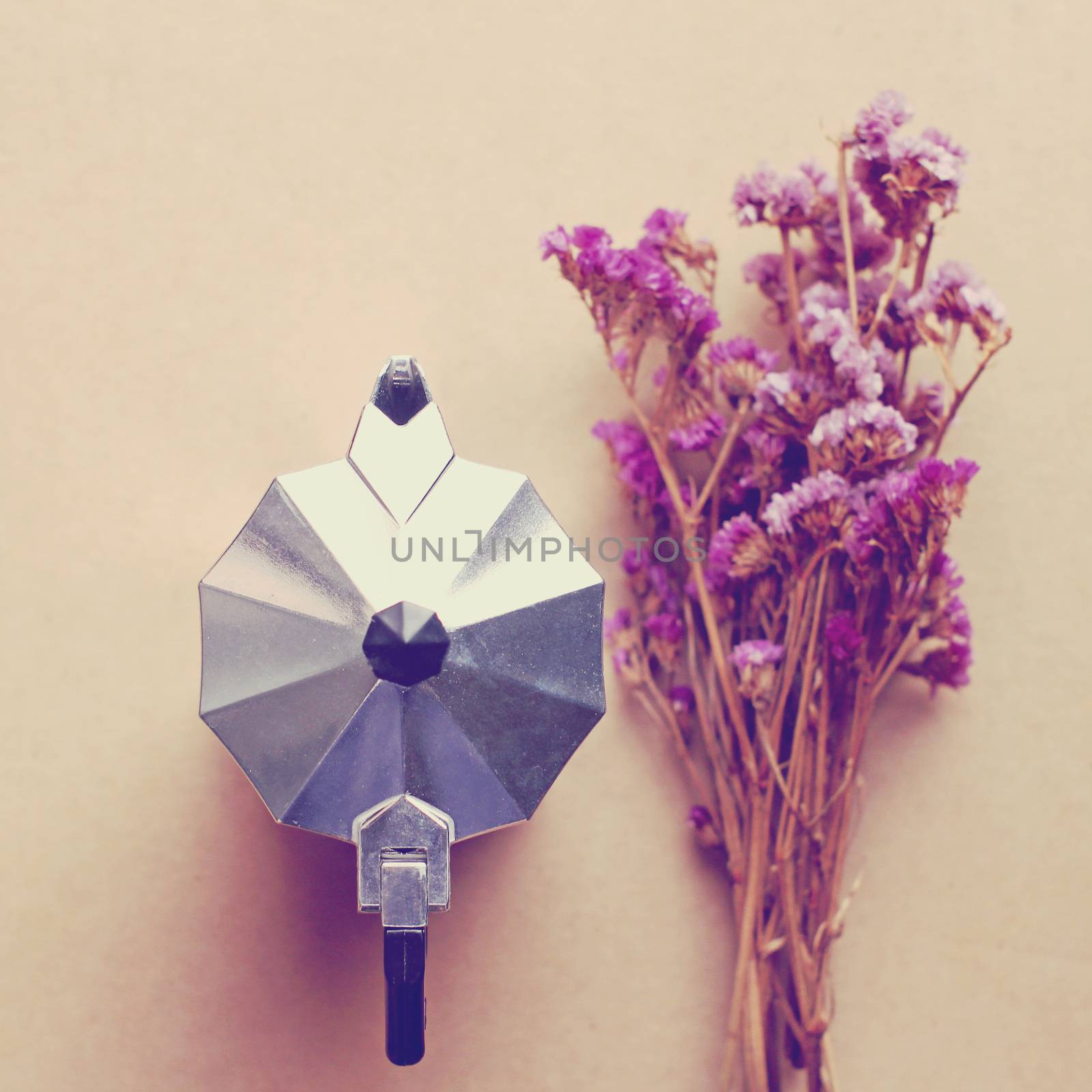 Italian coffee maker and flower with retro filter effect by nuchylee