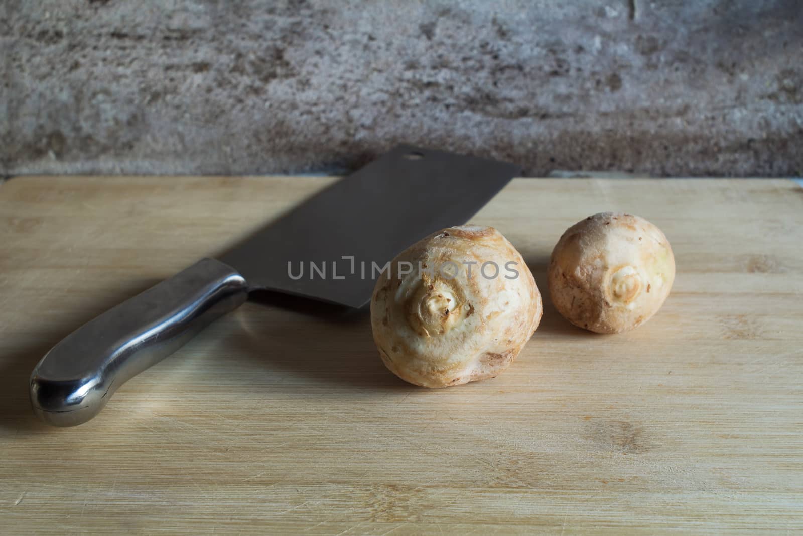 Taros and knife in kitchen