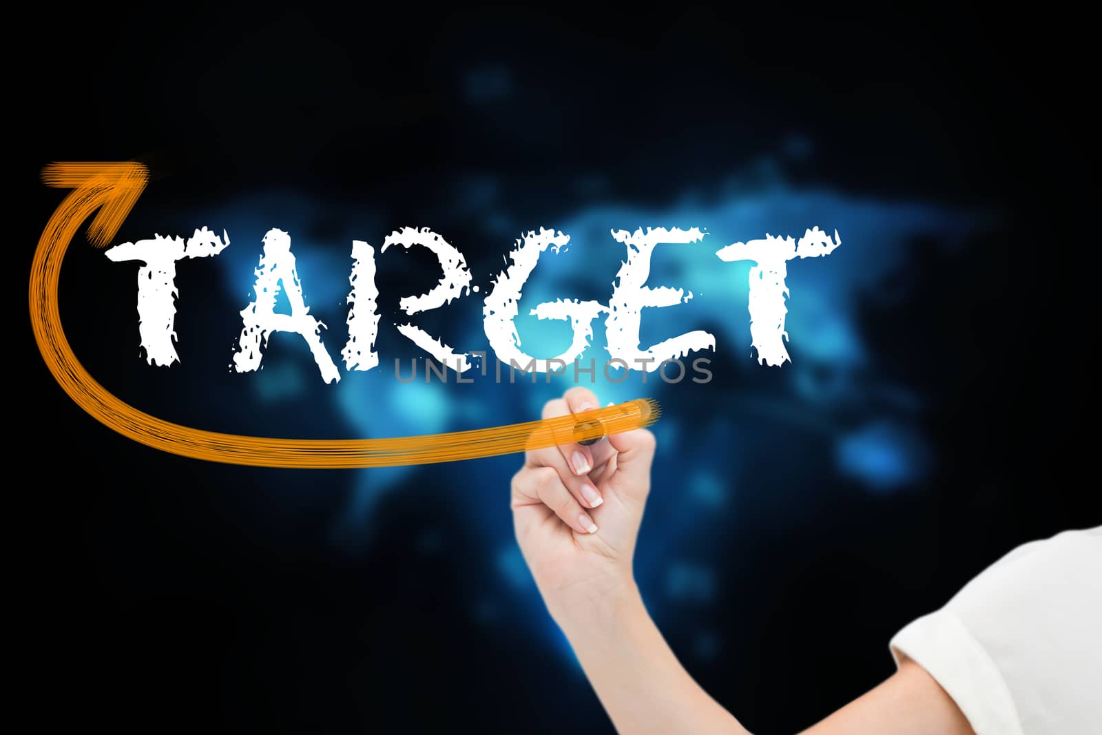 Businesswoman writing the word target by Wavebreakmedia