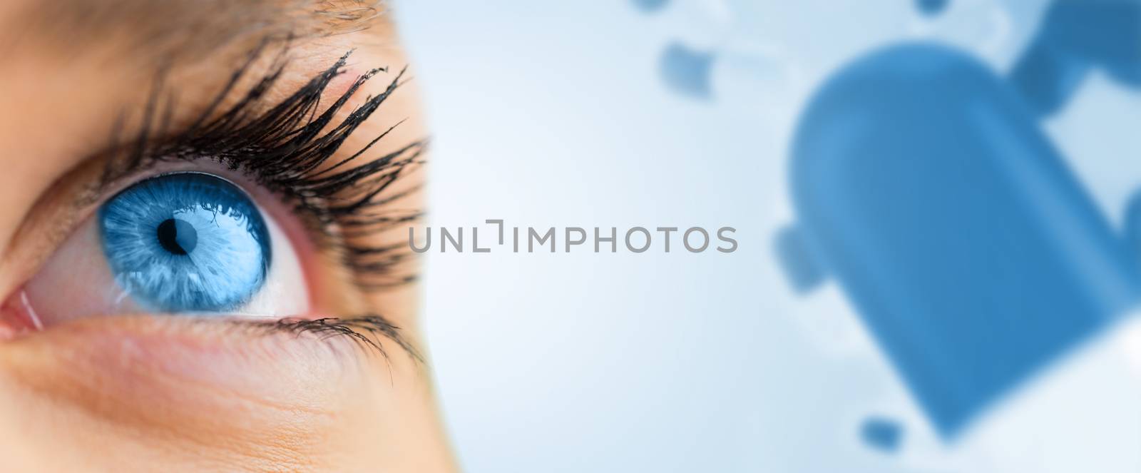 Composite image of blue eye looking up on female face by Wavebreakmedia