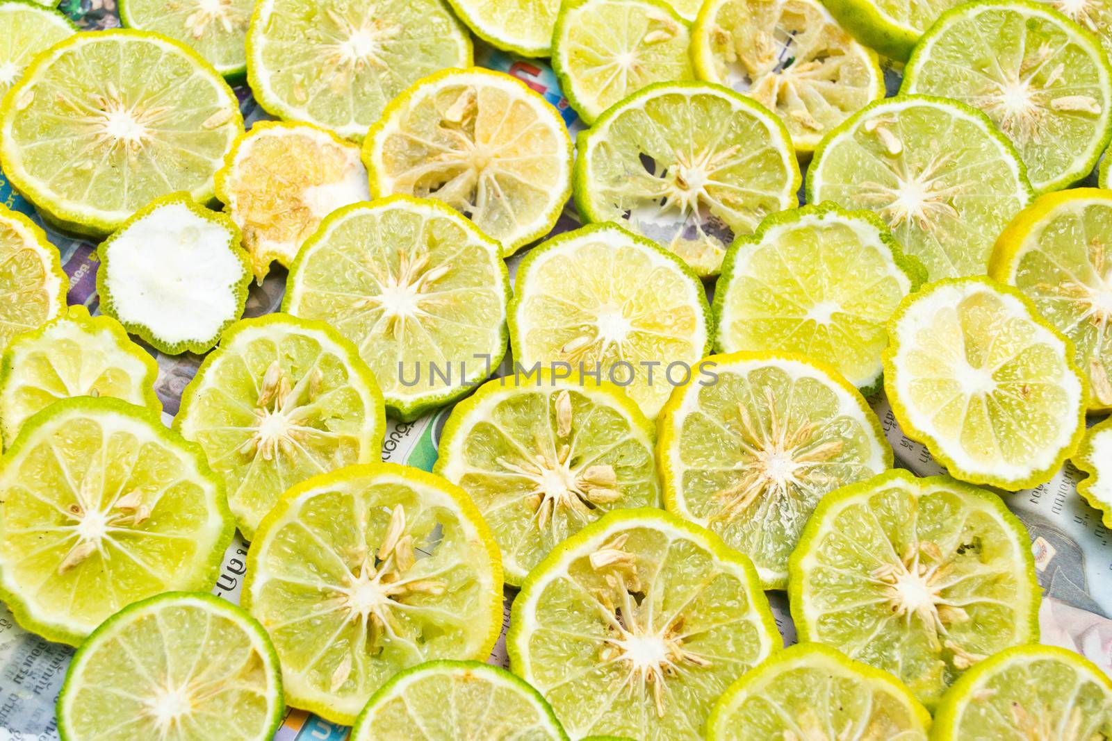 Close-up of fruit lemon slices by Thanamat