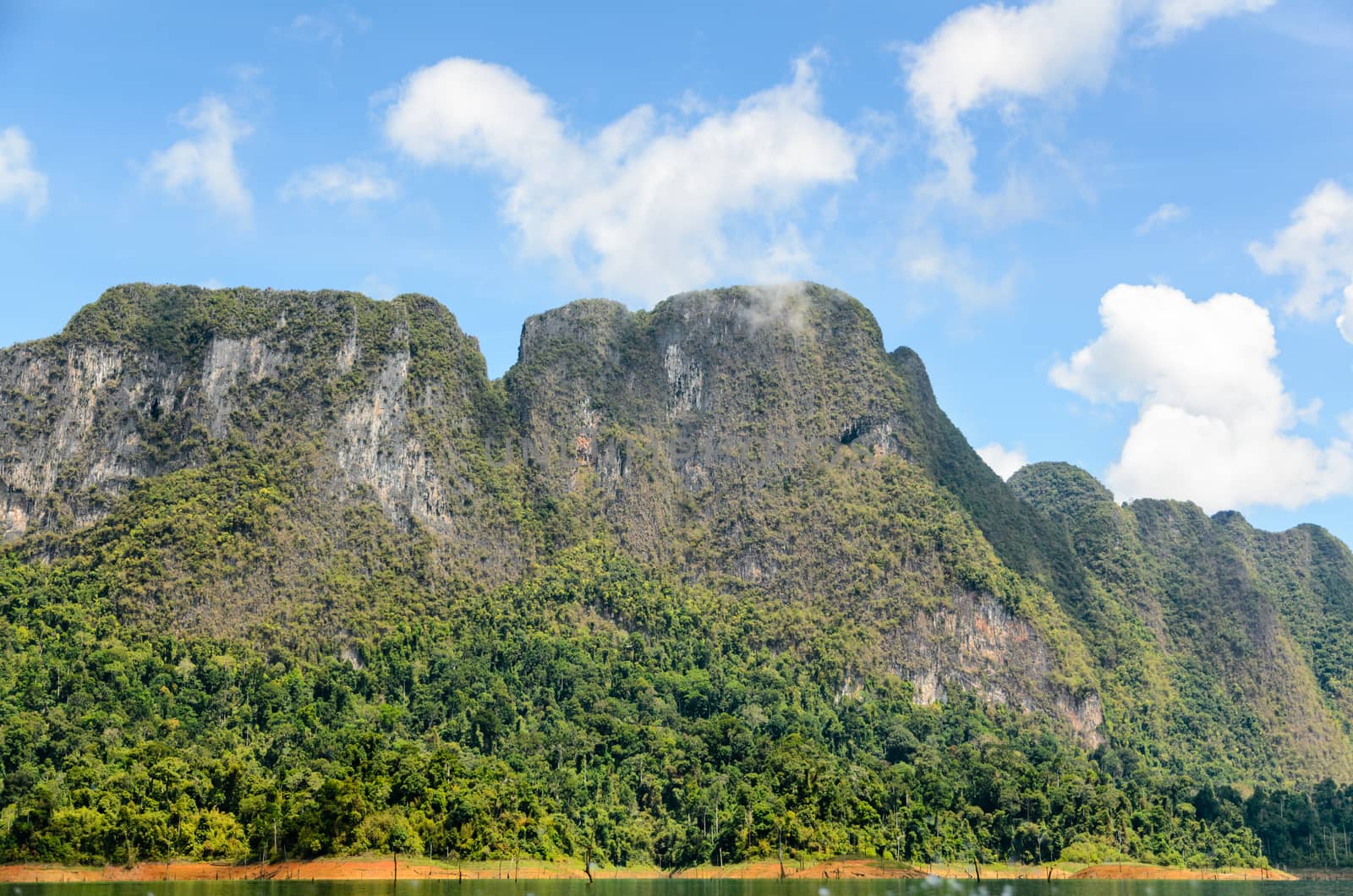 Beautiful mountain surrounded by water, Natural attractions at Ratchapapha dam in Khao Sok National Park, Surat Thani province, Guilin of Thailand.