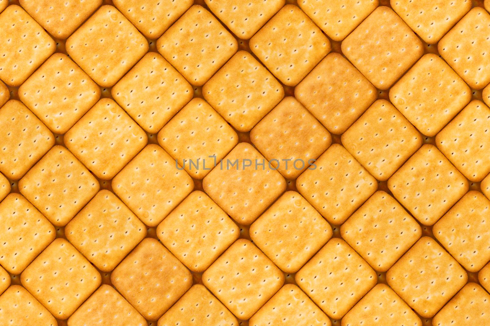 Background of crackers lined in neat rows