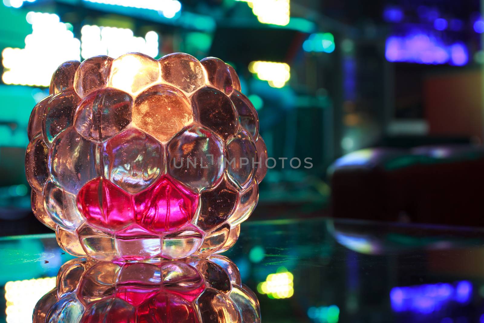 candle in the bar,flashing neon lights