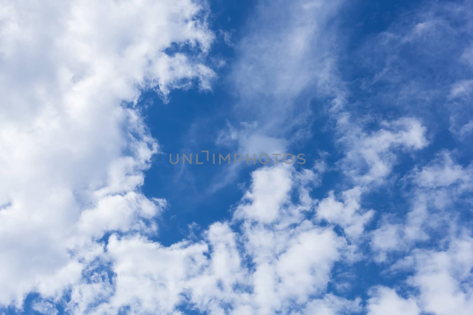 Abstract background of beautiful curly and sparse clouds