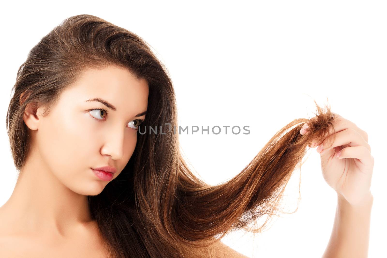 woman is not happy with her fragile hair, white background, copyspace