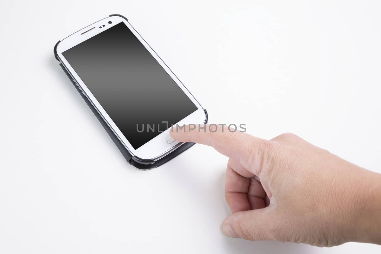 Picture of a hand touching a smartphone.