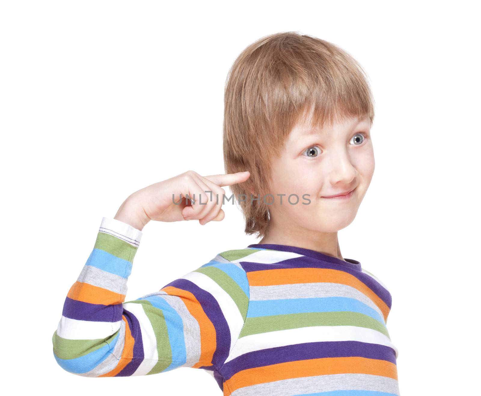 Boy in Colorful Shirt Pointing Finget to his Head - Isolated on White