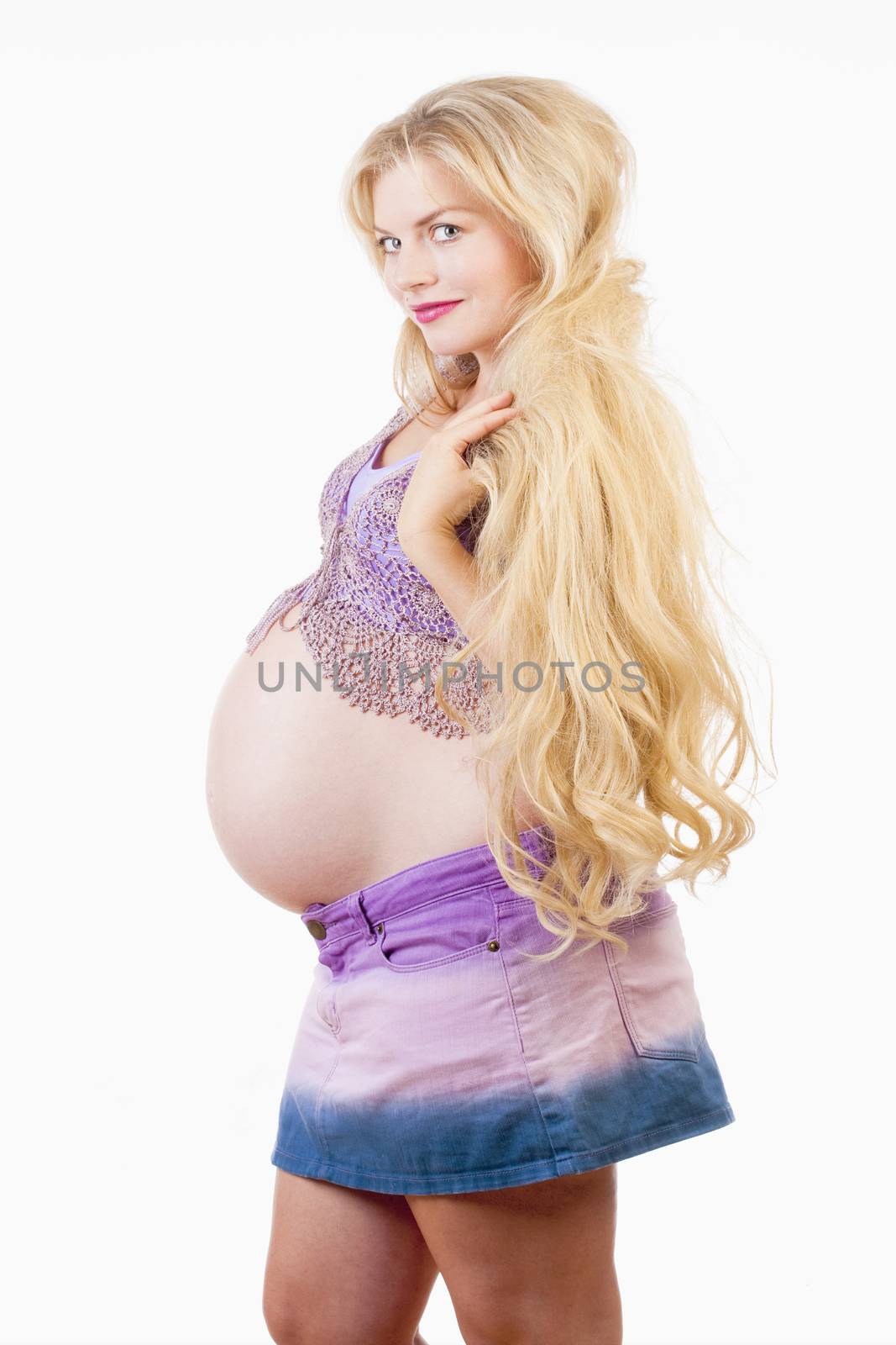 Young Pregnant Woman with Long Blond Hair by courtyardpix