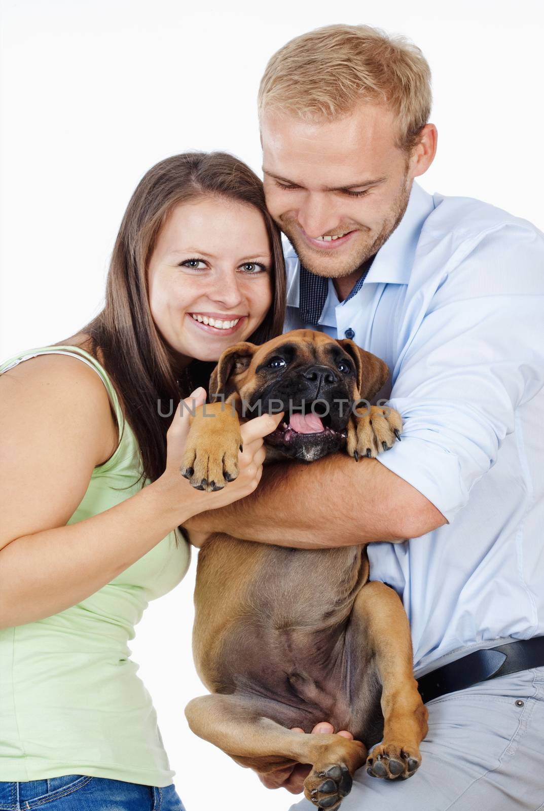 Portrait of a Happy Young Couple with a Dog. by courtyardpix