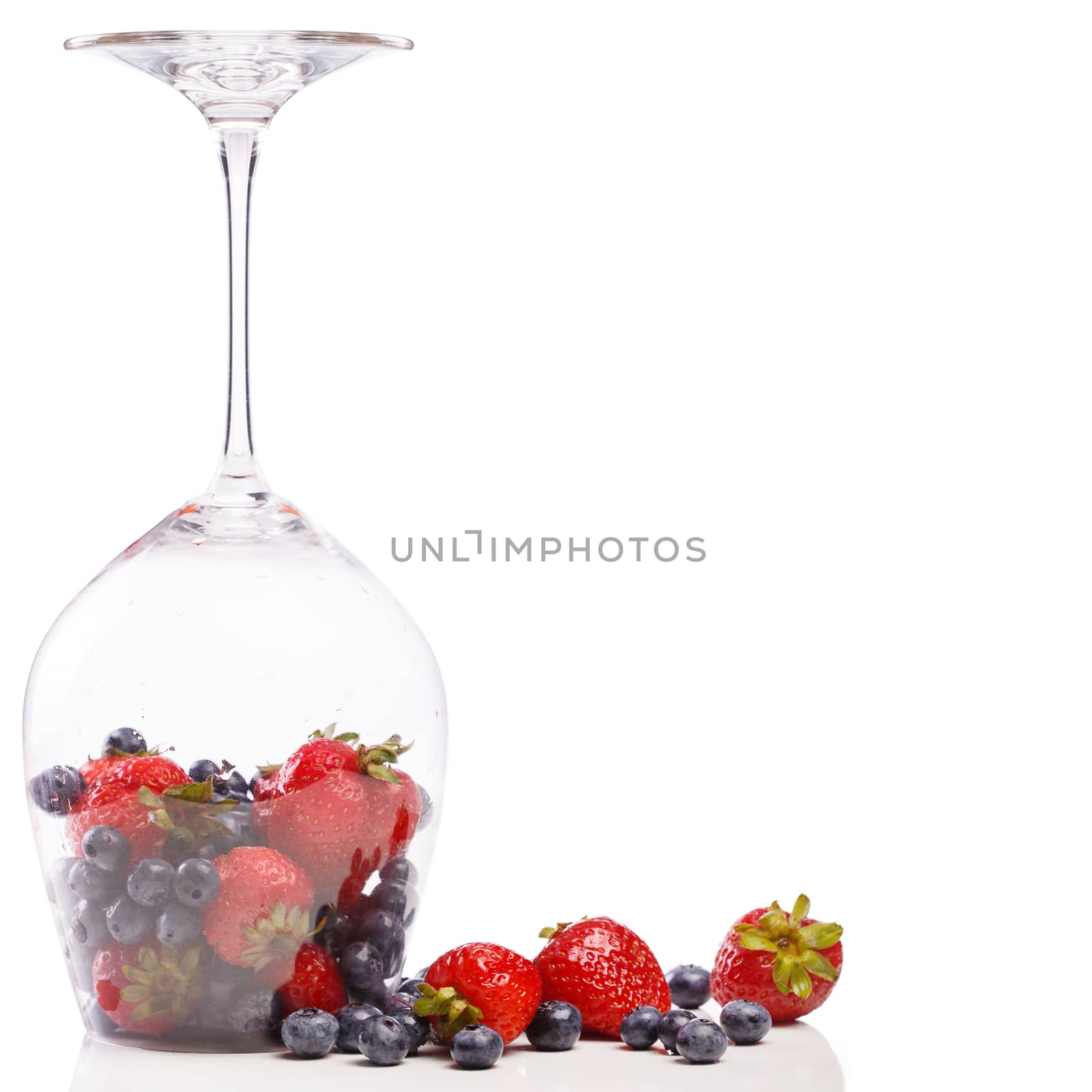 Food, nature. Heap of delicious berries on a white background