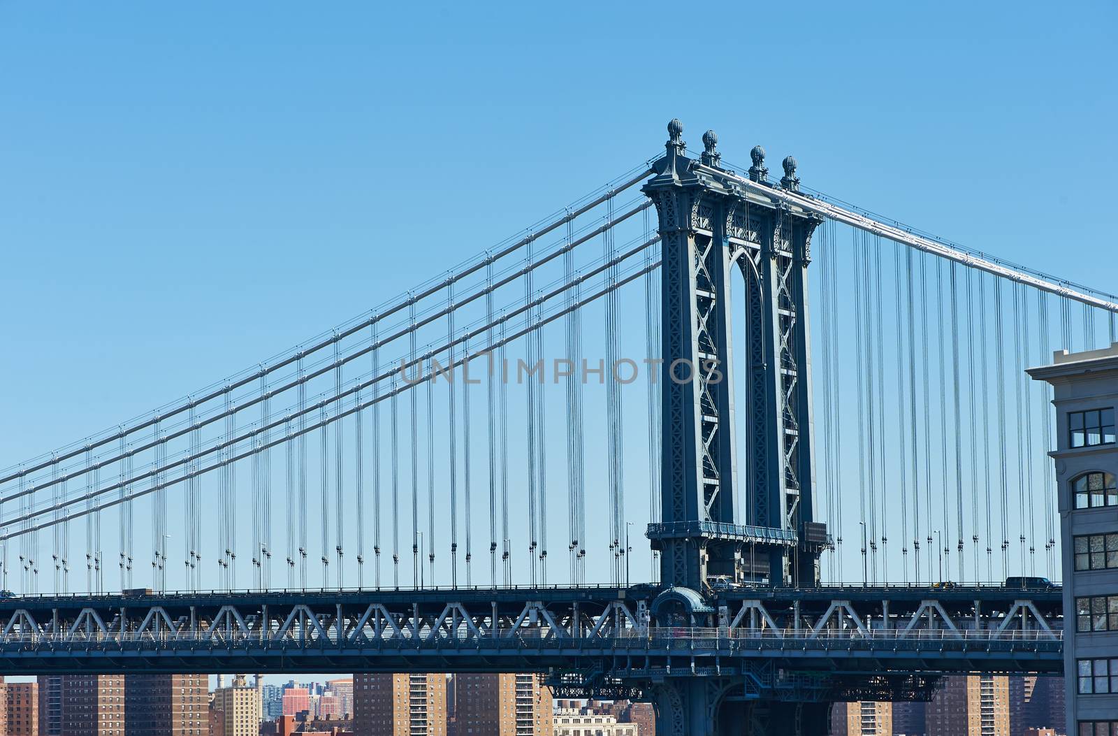 Manhattan Bridge and skyline view from Brooklyn Bridge in New York City