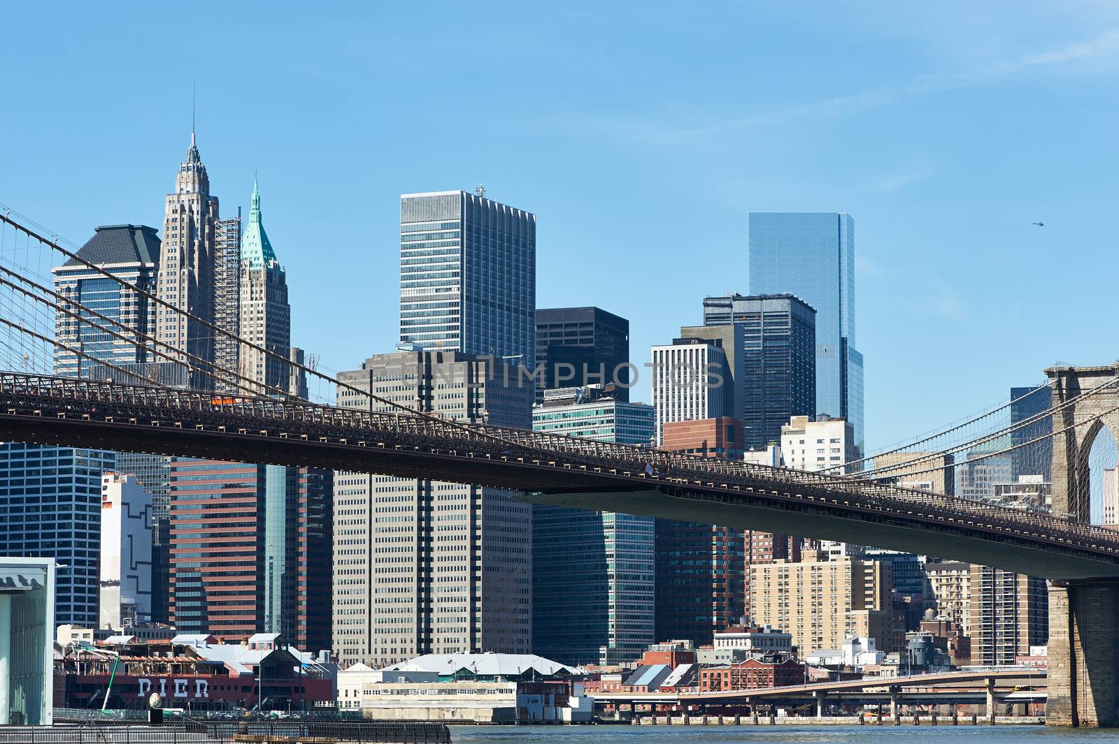 Brooklyn Bridge with lower Manhattan skyline by haveseen