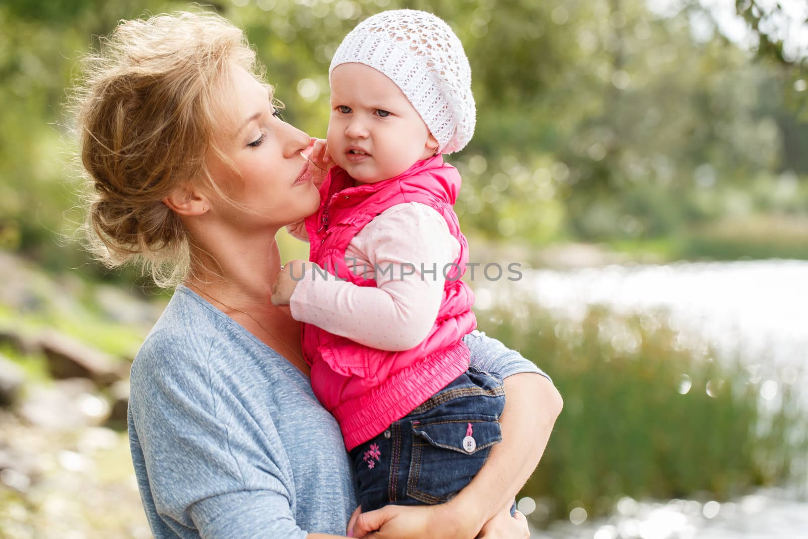 Young mother with adorable daughter