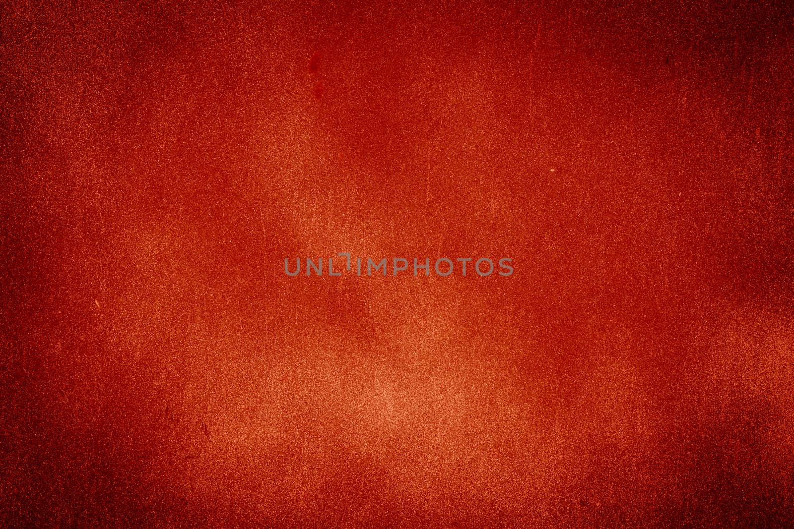 Red texture background with bright center spotlight