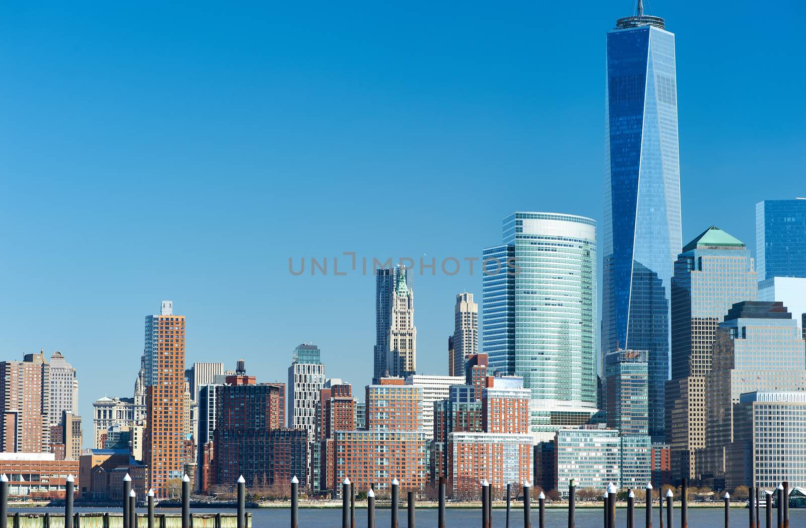 New York City Manhattan skyline with One World Trade Center Tower (AKA Freedom Tower) over Hudson River viewed from New Jersey