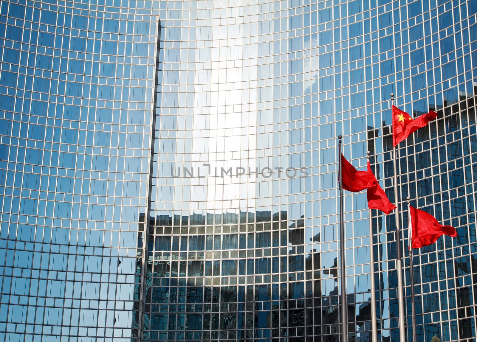 Office building and the Chinese national flag in Beijing