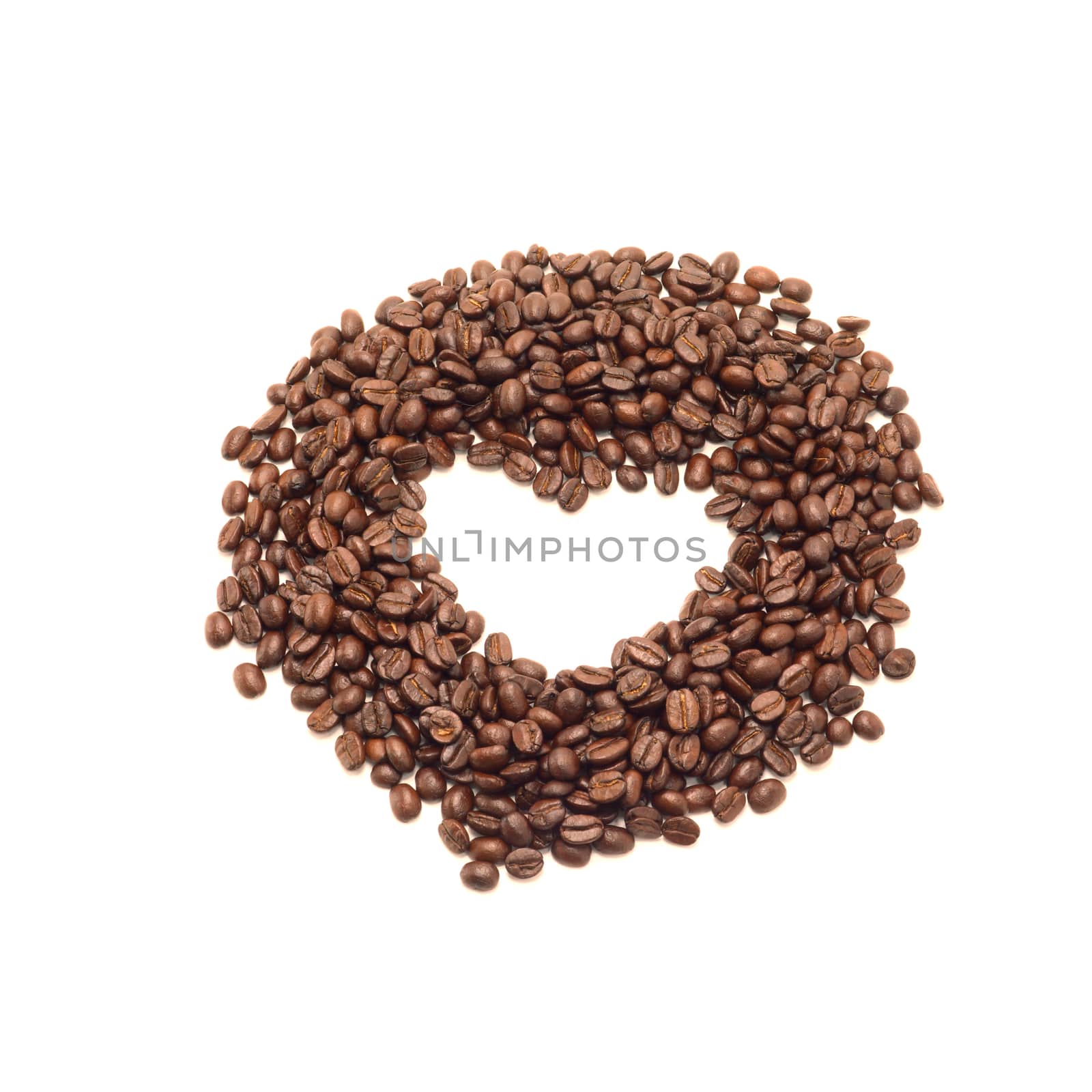 Coffee beans on the white background. by Noppharat_th