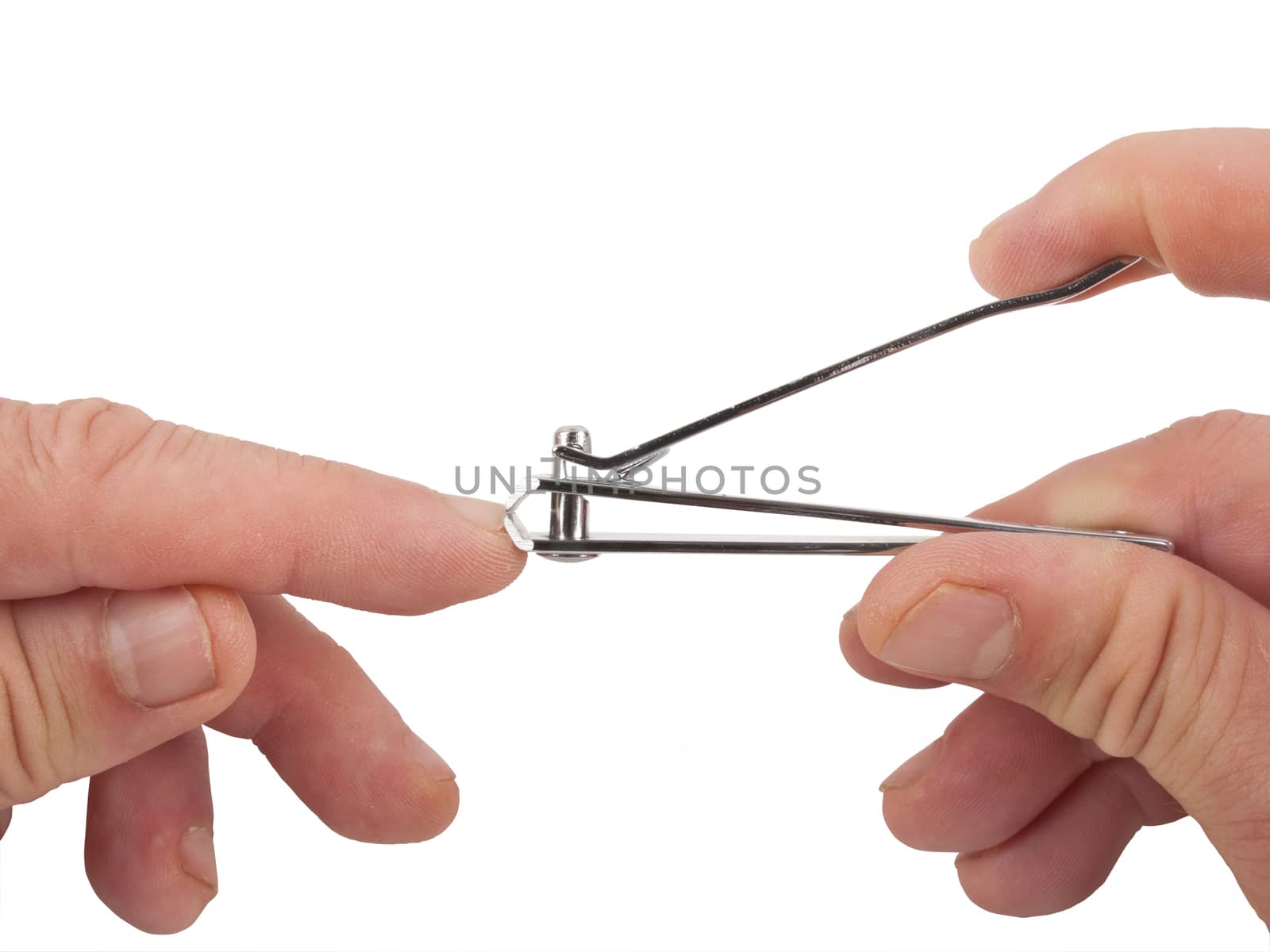 close up image of hands clipping nail