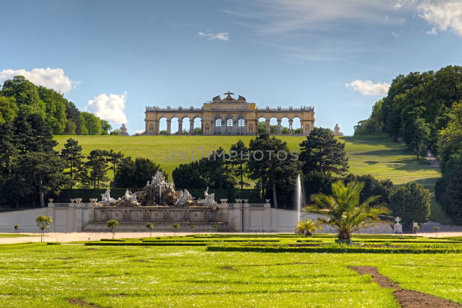 Photo shows general view of garden of Schonbrunn Palace.