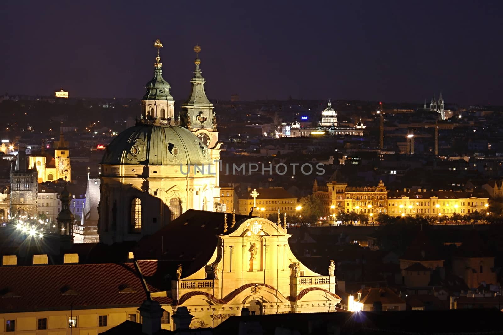 Photo shows details of Prague city at night.