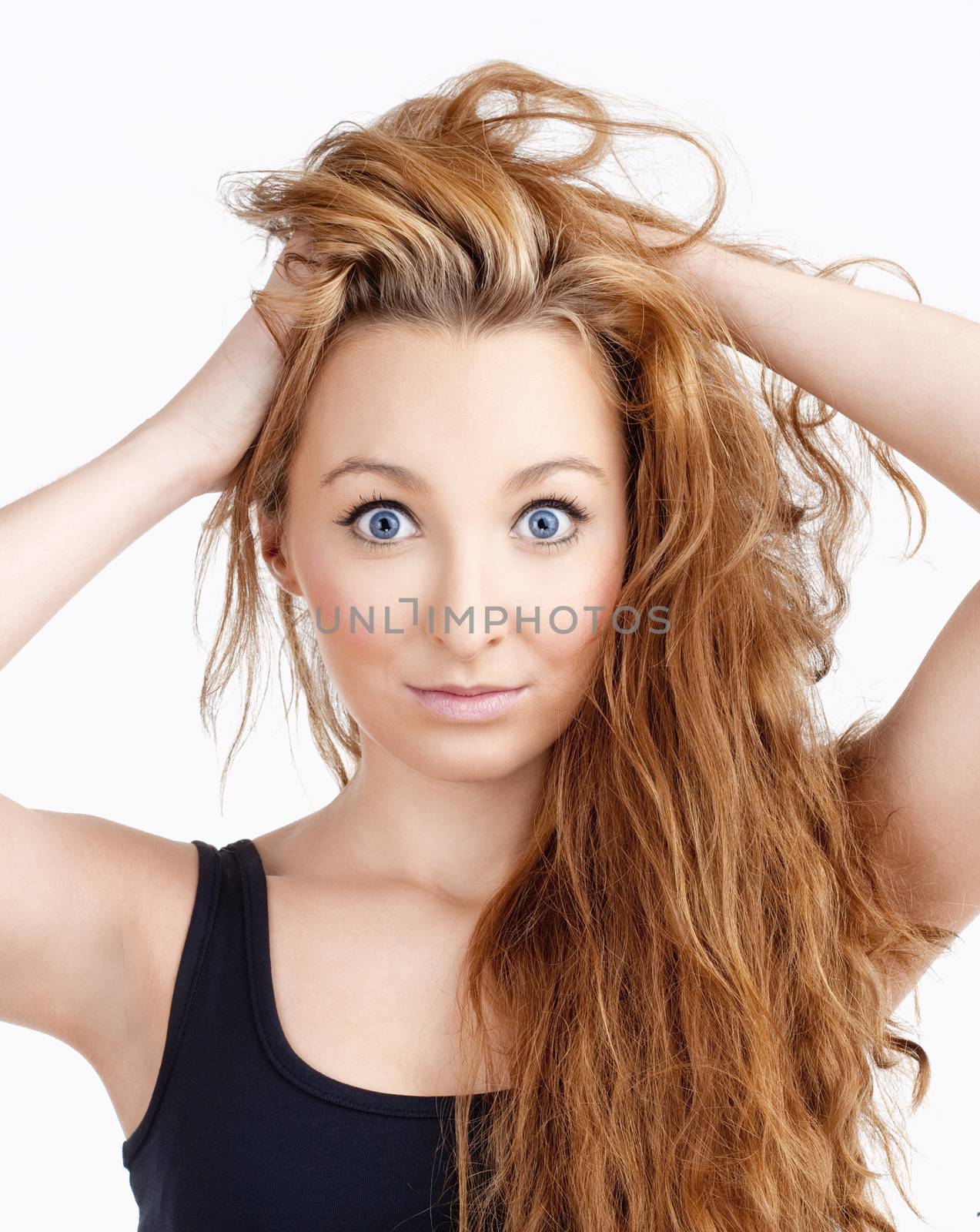 Young Beautiful Woman with Long Brown Hair and Big Blue Eyes Looking