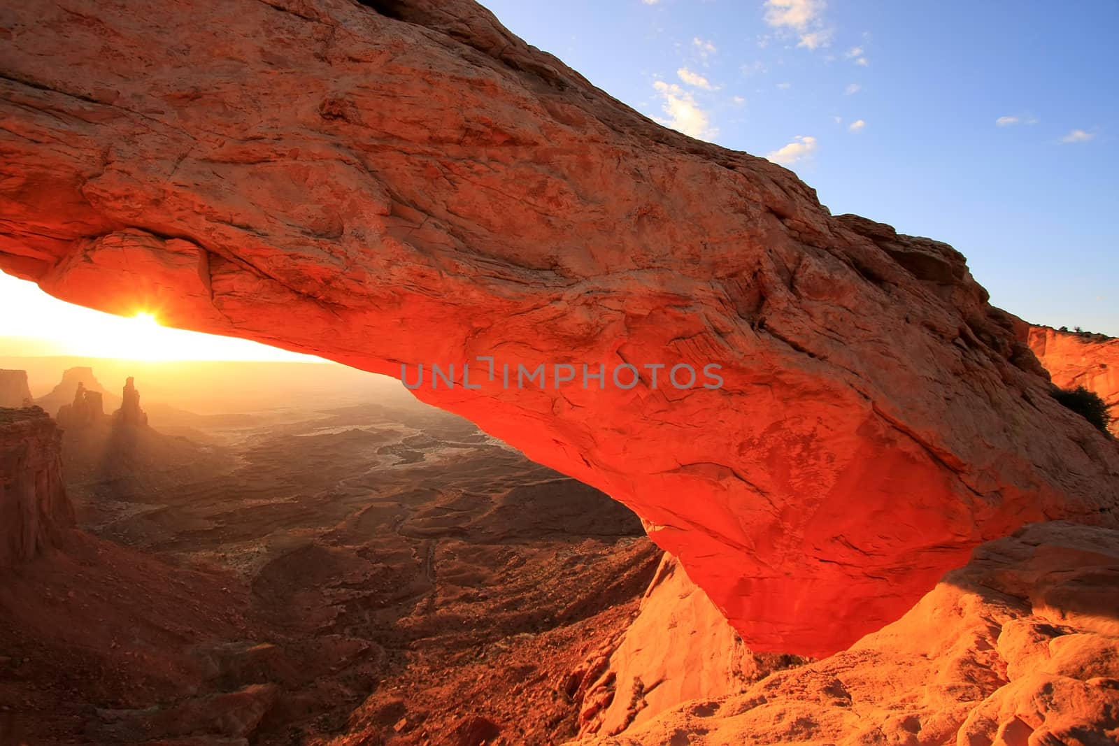 Glowing Mesa Arch at sunrise, Canyonlands National Park, Utah