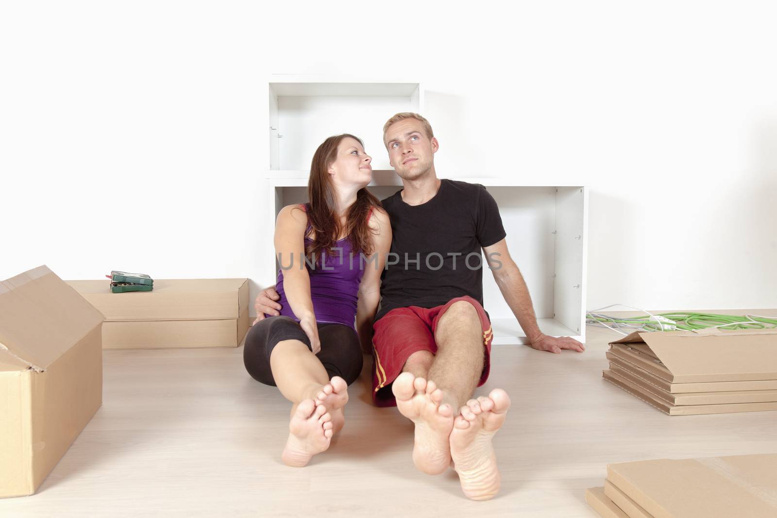 Young Couple Moving Together in a New Apartment