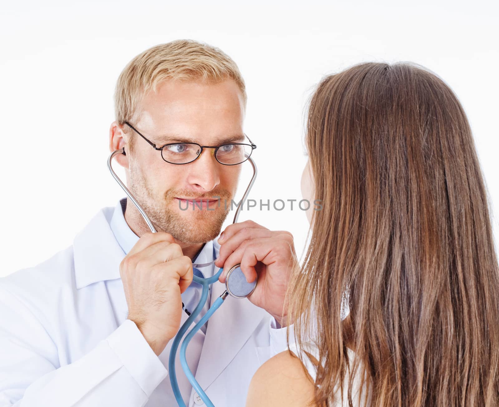 Young Doctor with Stethoscope and Glasses Examining Patient