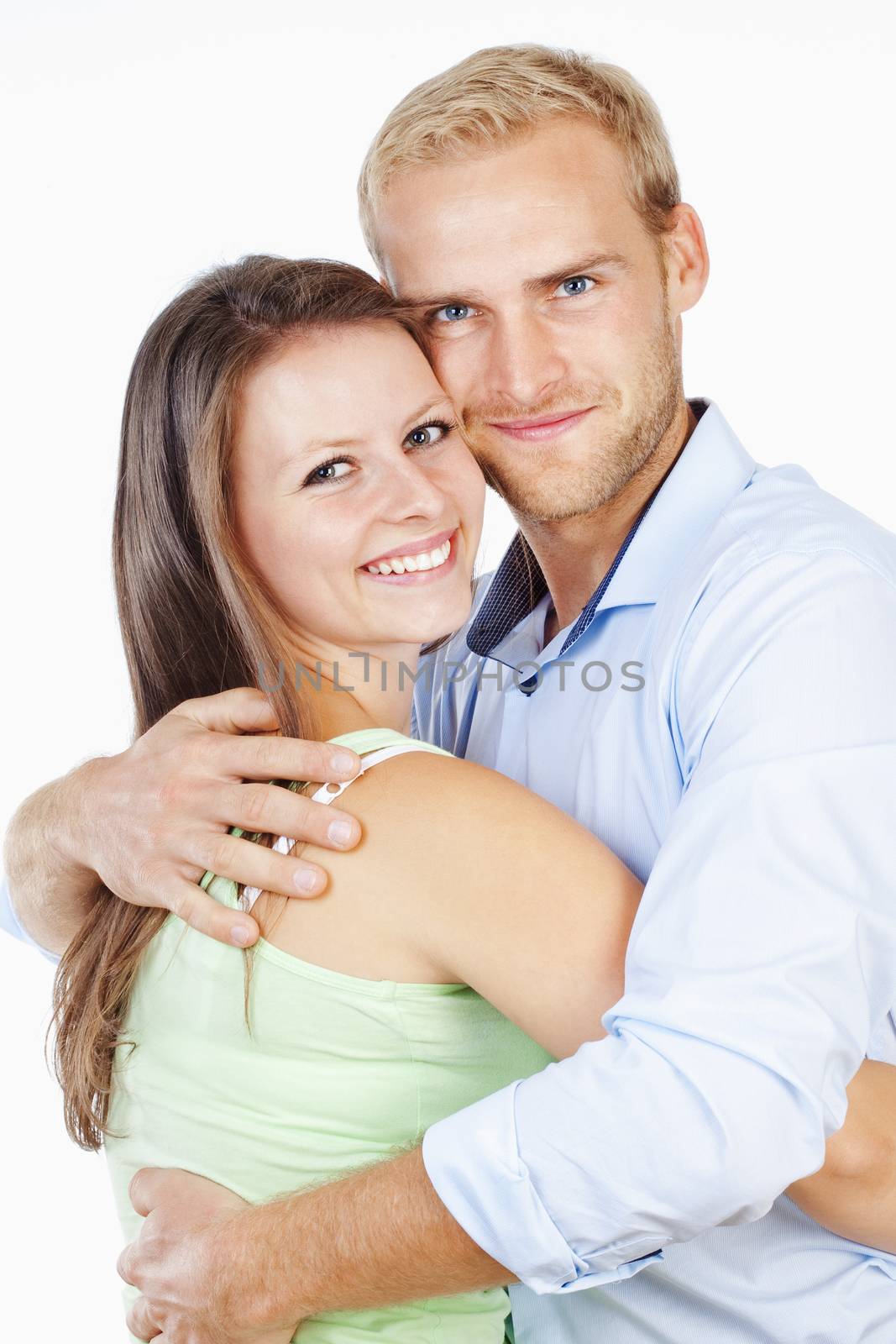 Portrait of a Happy Young Couple Smiling Looking - Isolated on White