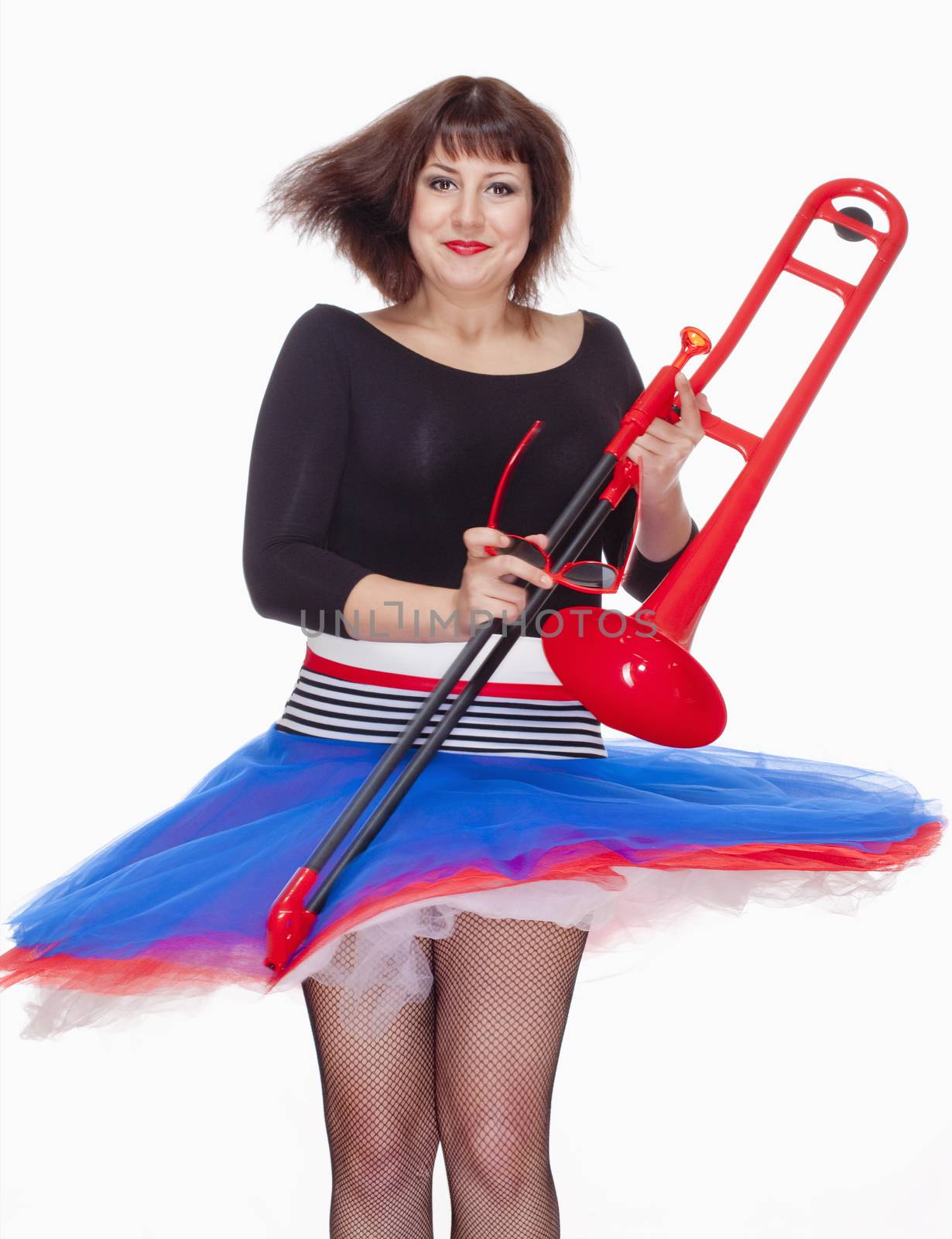 Young Female Musician with Red Trombone Dancing - Isolated on White