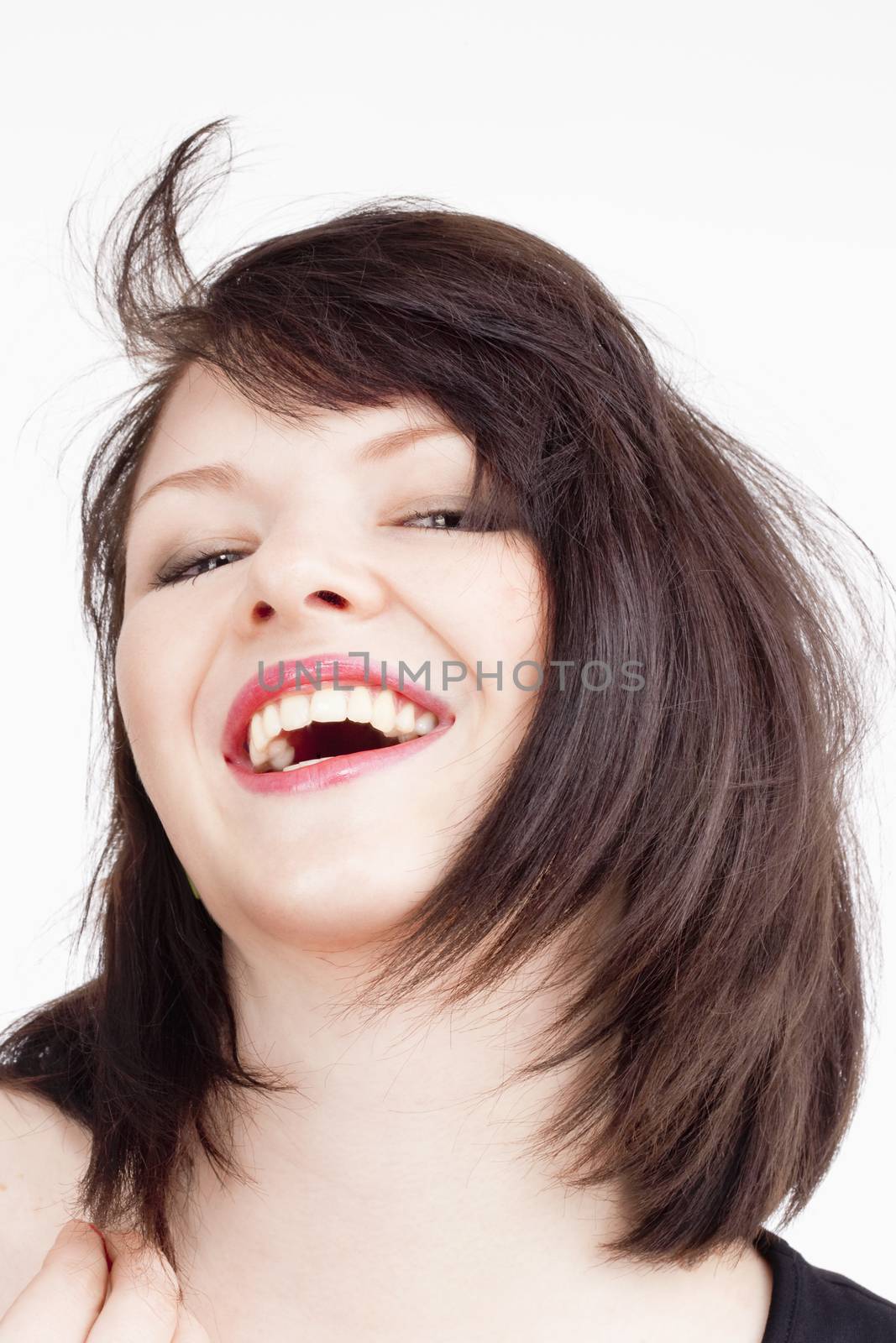 Portrait of a Young Beautiful Woman with Dark Brown Hair Smiling