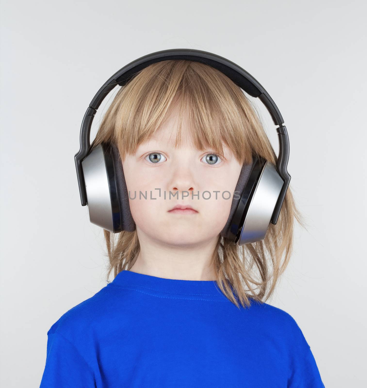 boy with headphones by courtyardpix