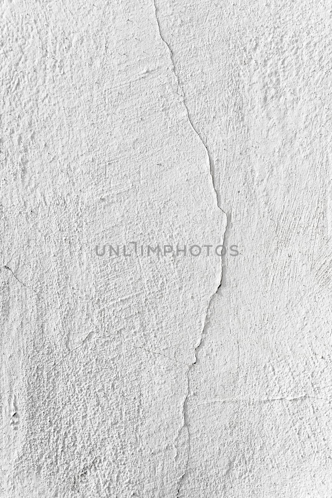 white wall with cracks