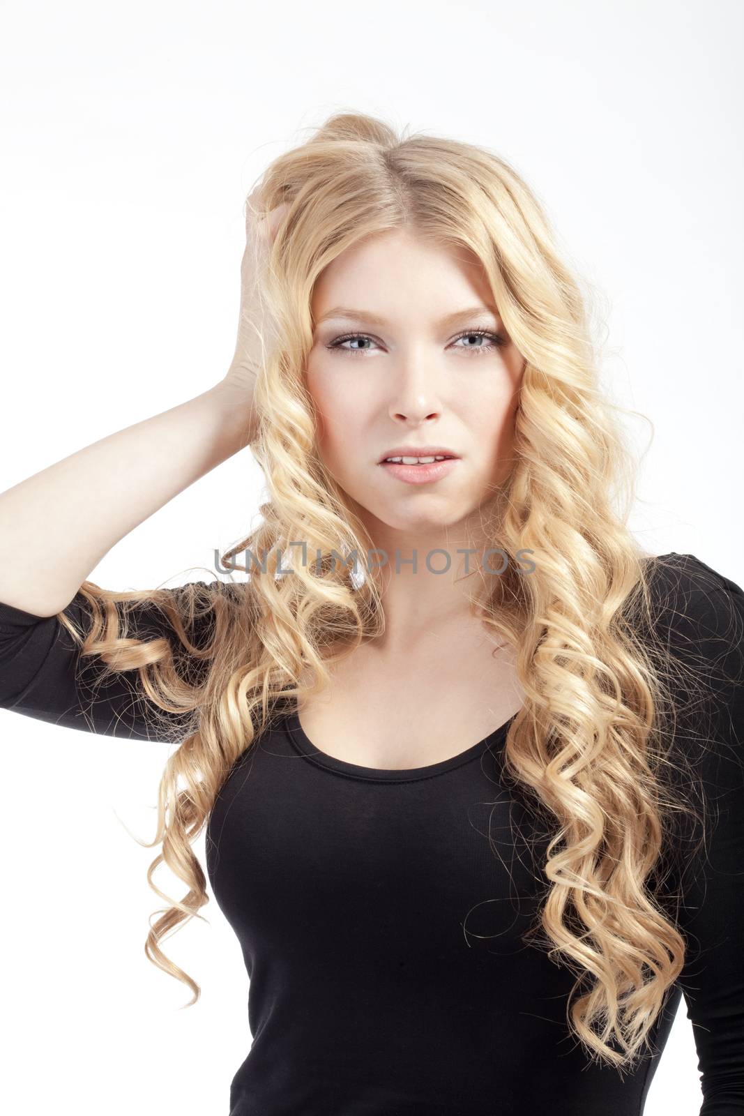 portrait of a young beautiful blond woman - isolated on white